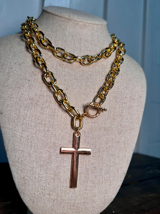 chunky gold chain necklaces, cross pendant necklaces for women, statement toggle necklaces, faith-inspired jewelry, and bold layered necklaces