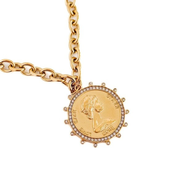 Gold necklace with a chunky chain and a round pendant inscribed with 'Love Each Other More', adorned with small diamonds.