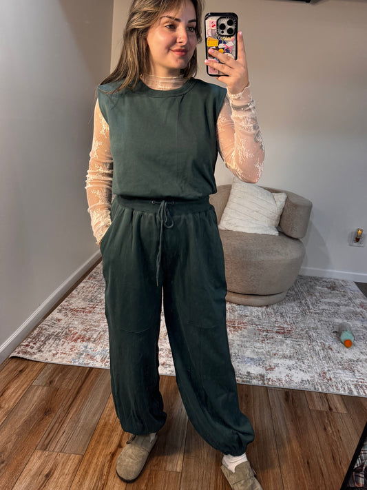 green jumpsuit