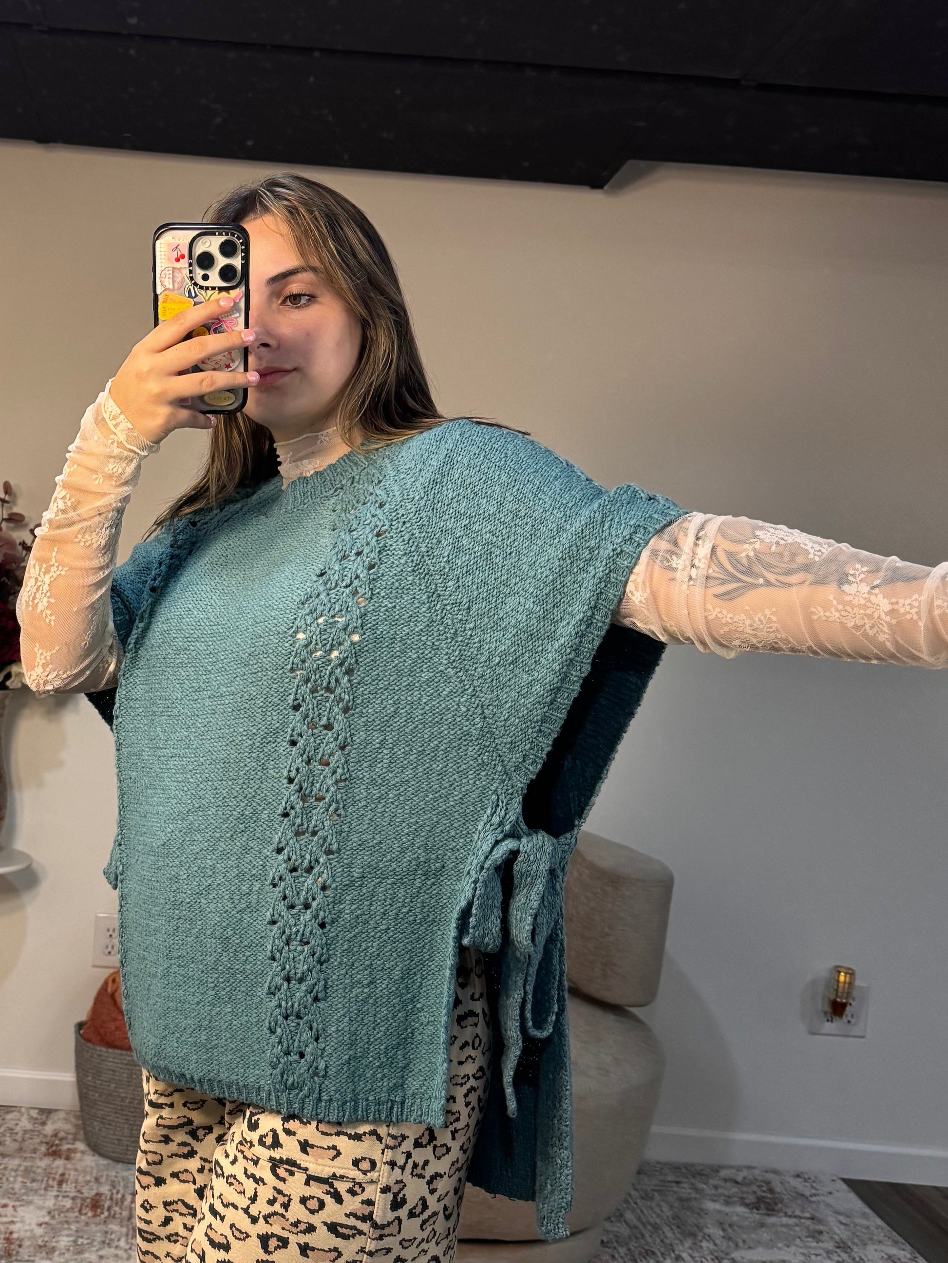 teal poncho sweater
