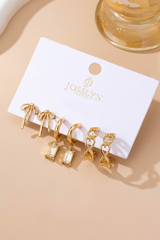 bow earring set, gold huggie earrings with charms, baguette crystal earrings, cute dainty earring sets, and trendy ear stack sets