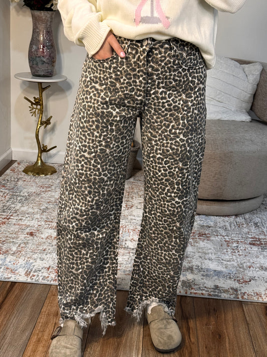 Person wearing leopard print pants l