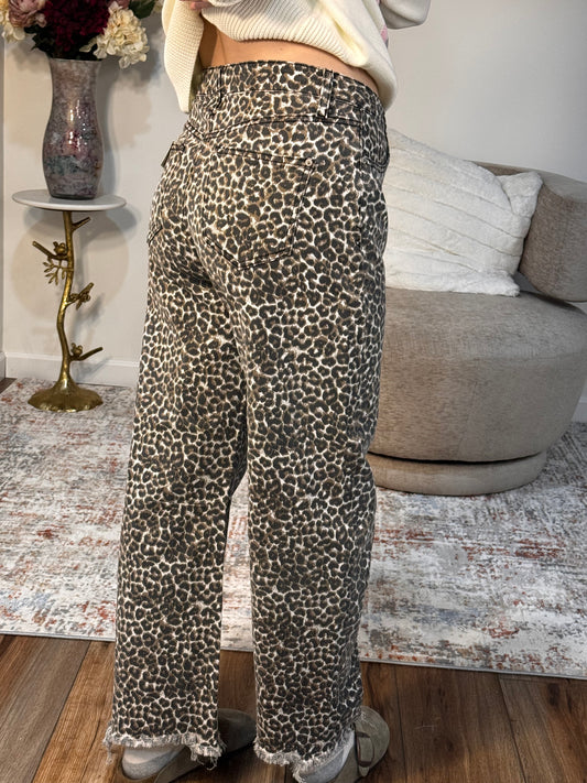 Person wearing leopard print pants 