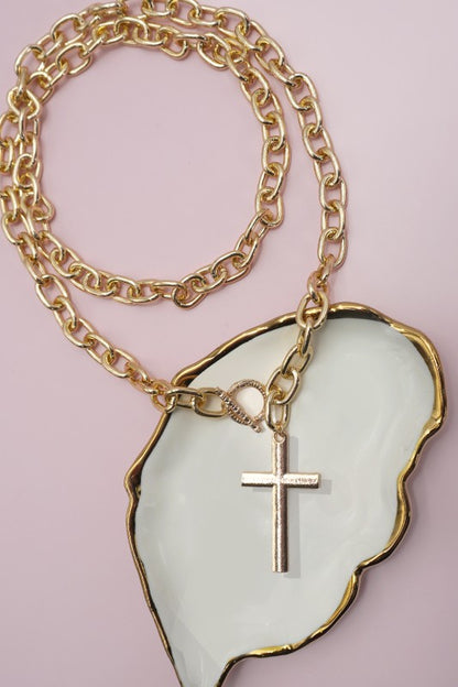 chunky gold chain necklaces, cross pendant necklaces for women, statement toggle necklaces, faith-inspired jewelry, and bold layered necklaces