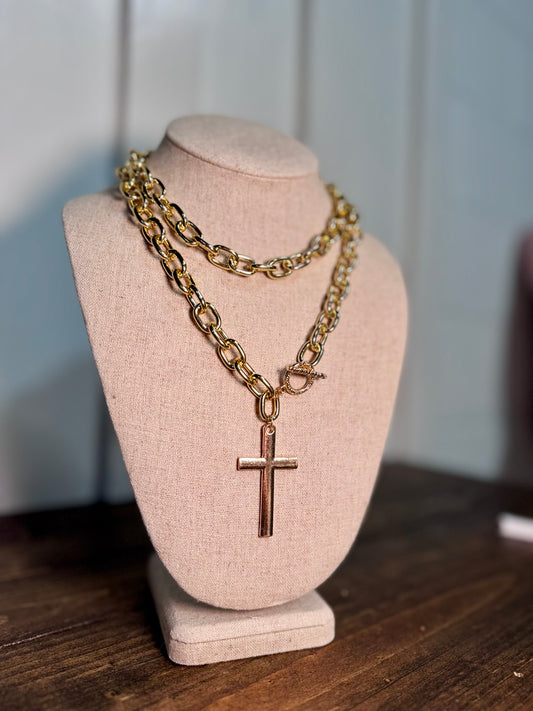 chunky gold chain necklaces, cross pendant necklaces for women, statement toggle necklaces, faith-inspired jewelry, and bold layered necklaces