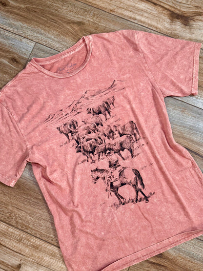 Mineral-washed orange graphic tee with a crew neckline and short sleeves, featuring a ranch life illustration.