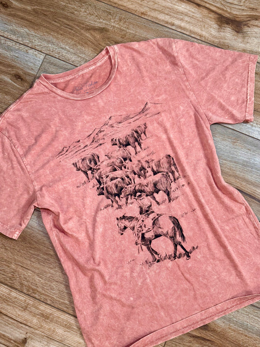 Mineral-washed orange graphic tee with a crew neckline and short sleeves, featuring a ranch life illustration.