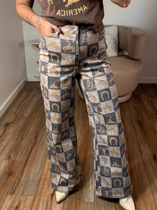Charcoal wide leg denim pants with a western checkerboard pattern and high-rise waist.