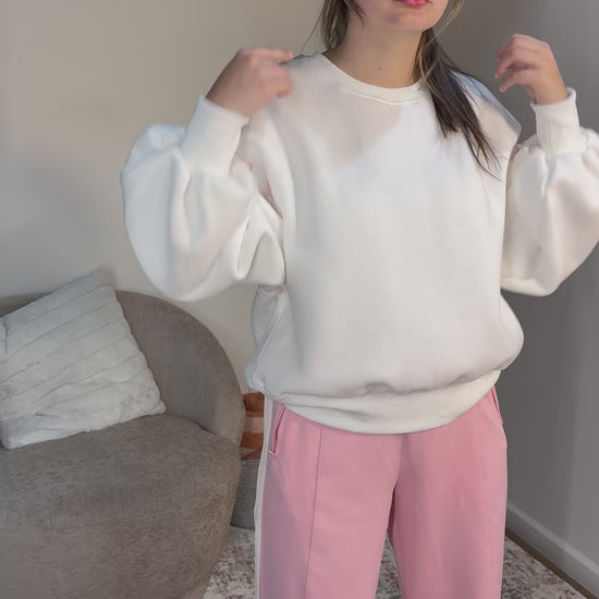 pink pants white sweatshirt
