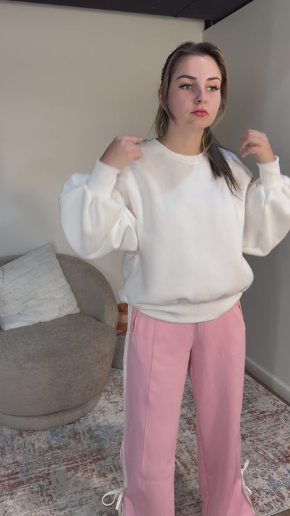 pink pants white sweatshirt
