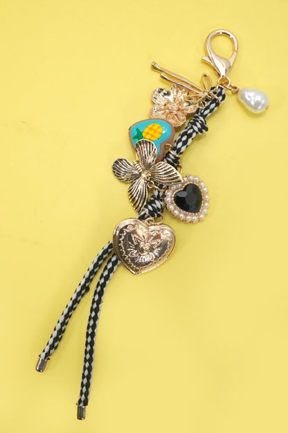 Bag Charm with Rope Heart and Porcelain Fruit, Gold